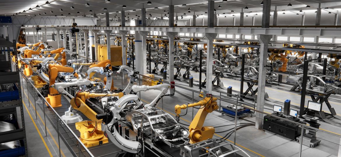 Cars on production line in factory
