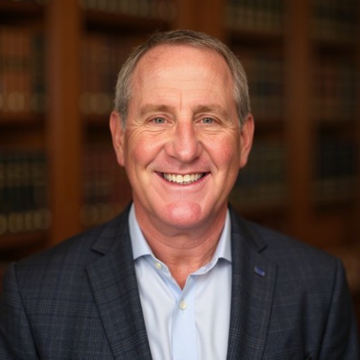 Headshot of Speaker Name