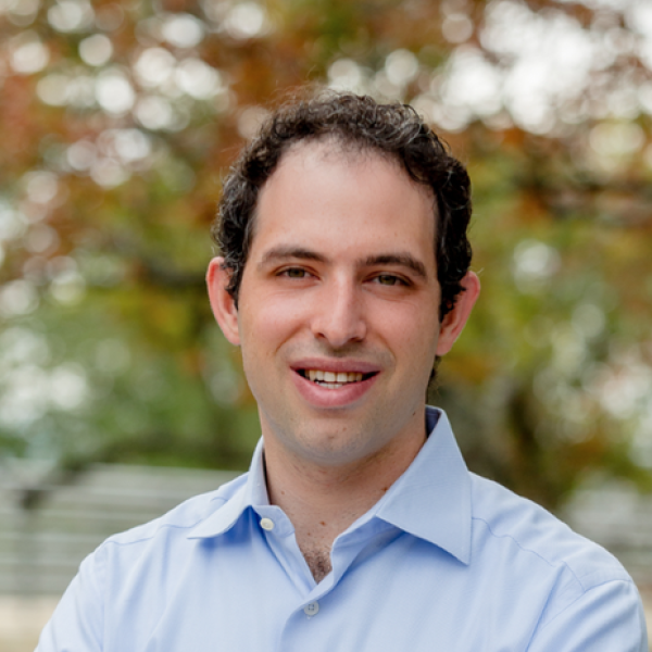 Headshot of Speaker Name